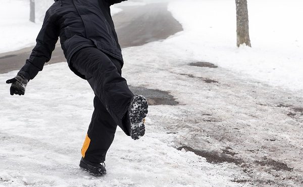 person slipping on ice in winter