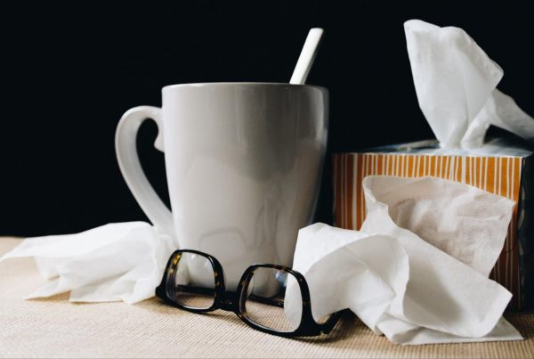 mug, eye-glasses, and tissues